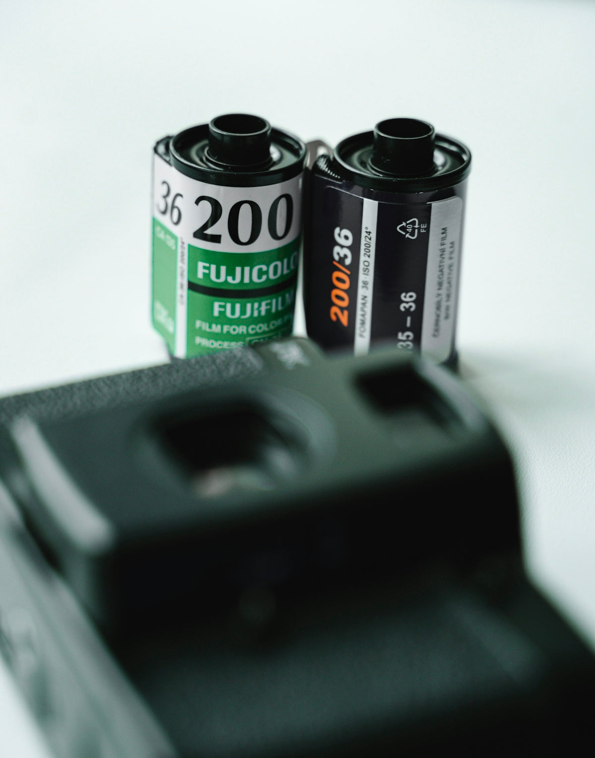 two black and green camera film