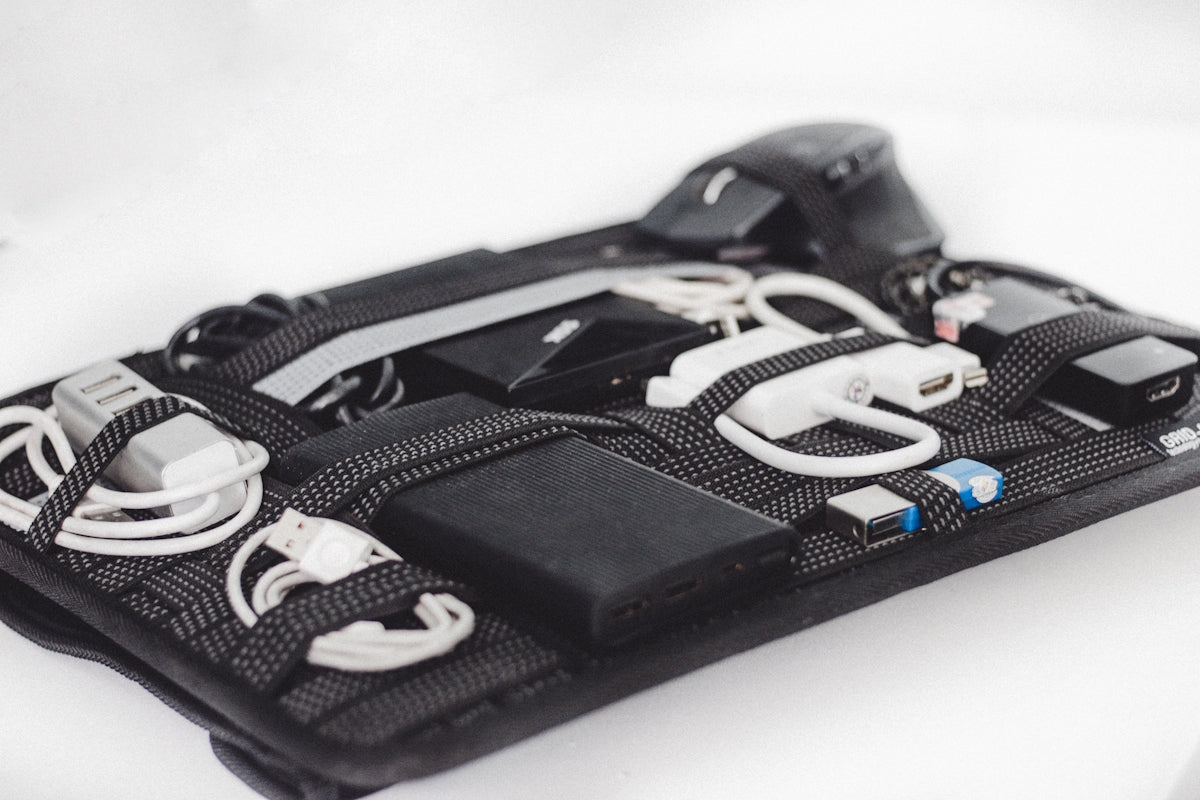 a black case with a bunch of cords in it