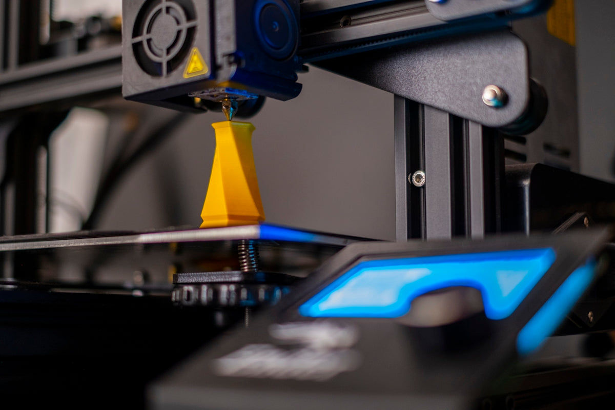 a close up of a machine with a blue light on it