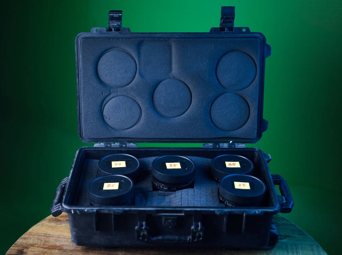 A black case with four cups inside of it